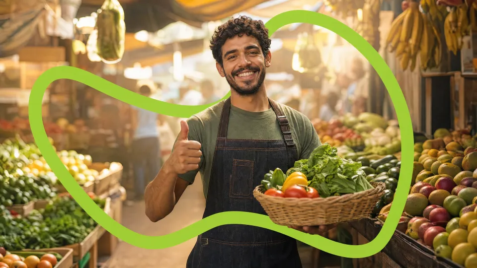 A smiling market vendor holding a basket of fresh produce